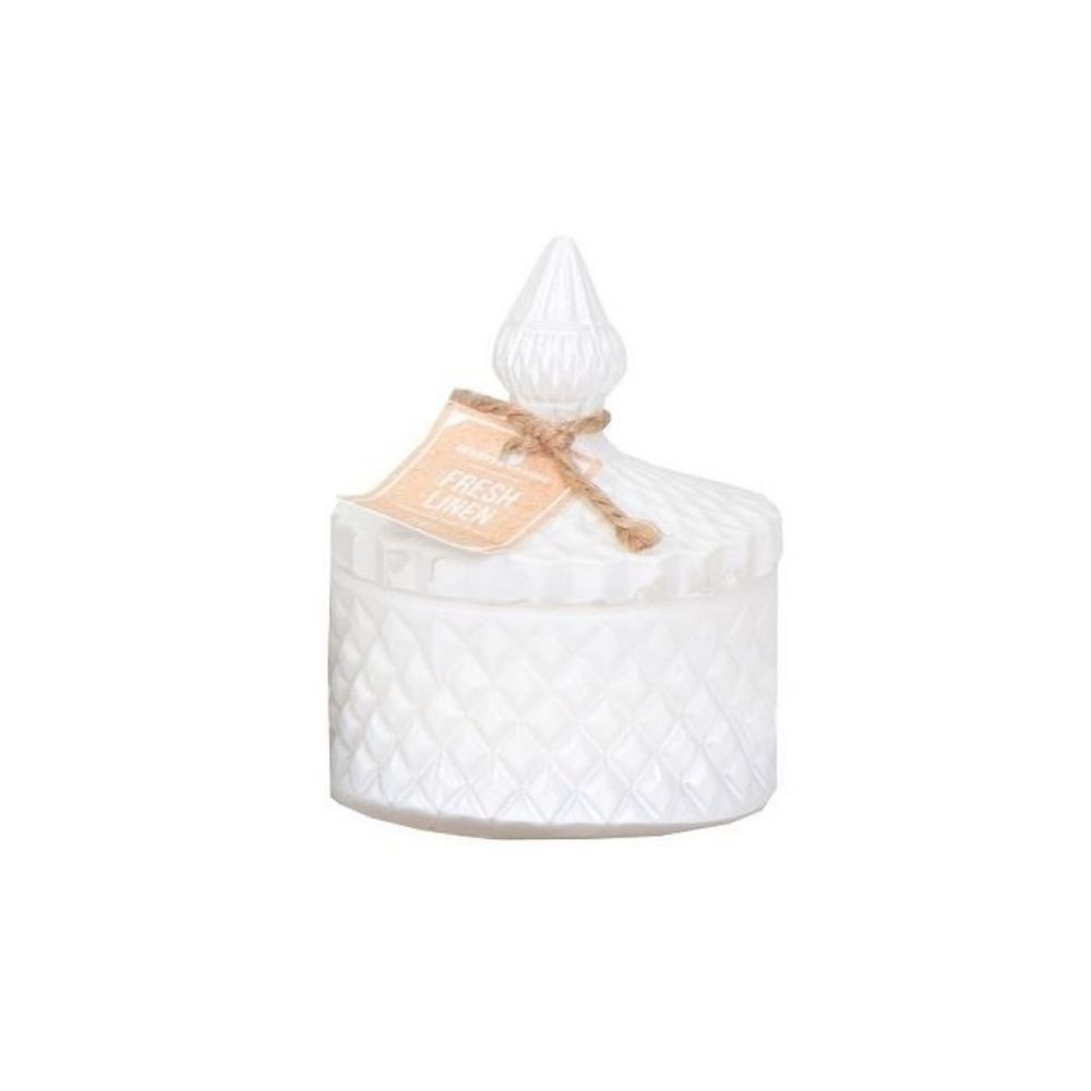 Ένα λευκό βάζο με καπάκι και μπεζ ετικέτα