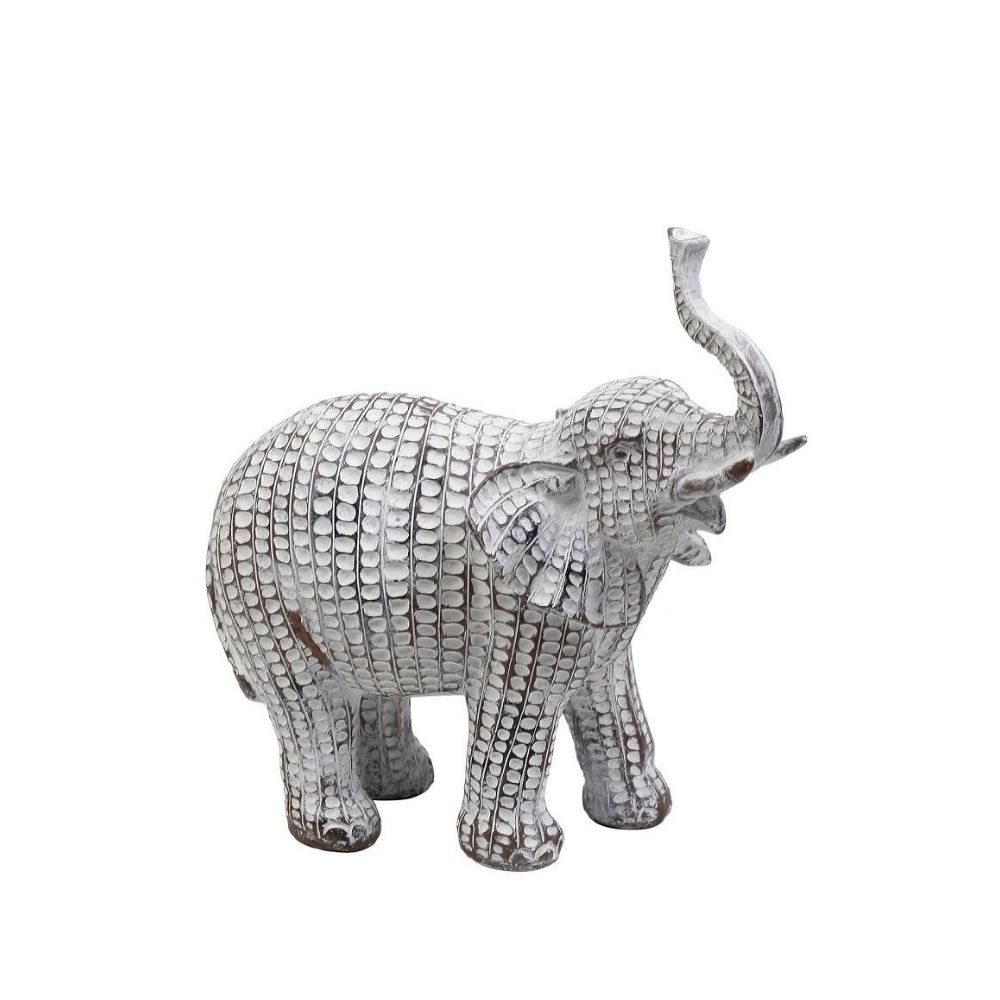 Ένας μικρός μπεζ ελέφαντας με λευκές βούλες και σηκωμένη προβοσκίδα