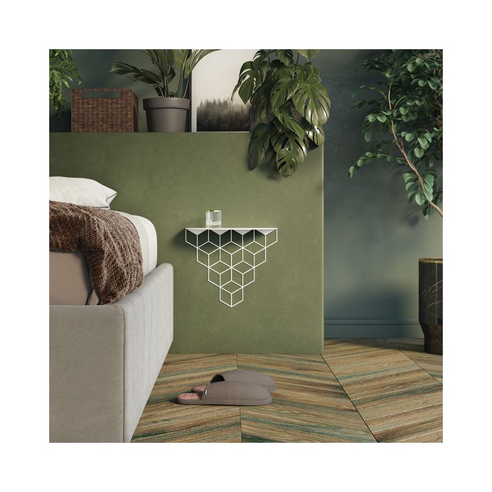 Ένα γεωμετρικό μαύρο ράφι για κομοδίνο δίπλα από κρεβάτι