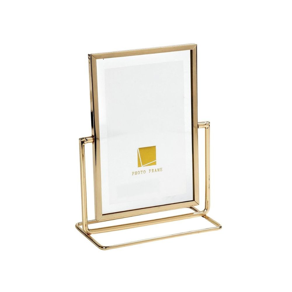 Μία μεταλλική χρυσή κορνίζα διπλής όψης κάθετη