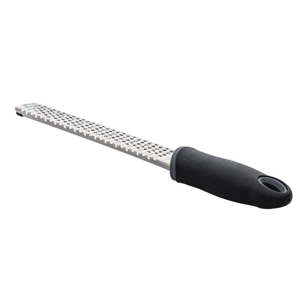 Ένα ανοξείδωτος τρίφτης zester χειρός 24 εκατοστών φωτογραφισμένος διαγώνια